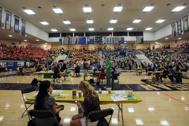 Elementary school children fill the stands at Cliff Keen Arena during the 14th Annual Kids' Fair at University of Michigan on Friday. Melanie Maxwell I AnnArbor.com